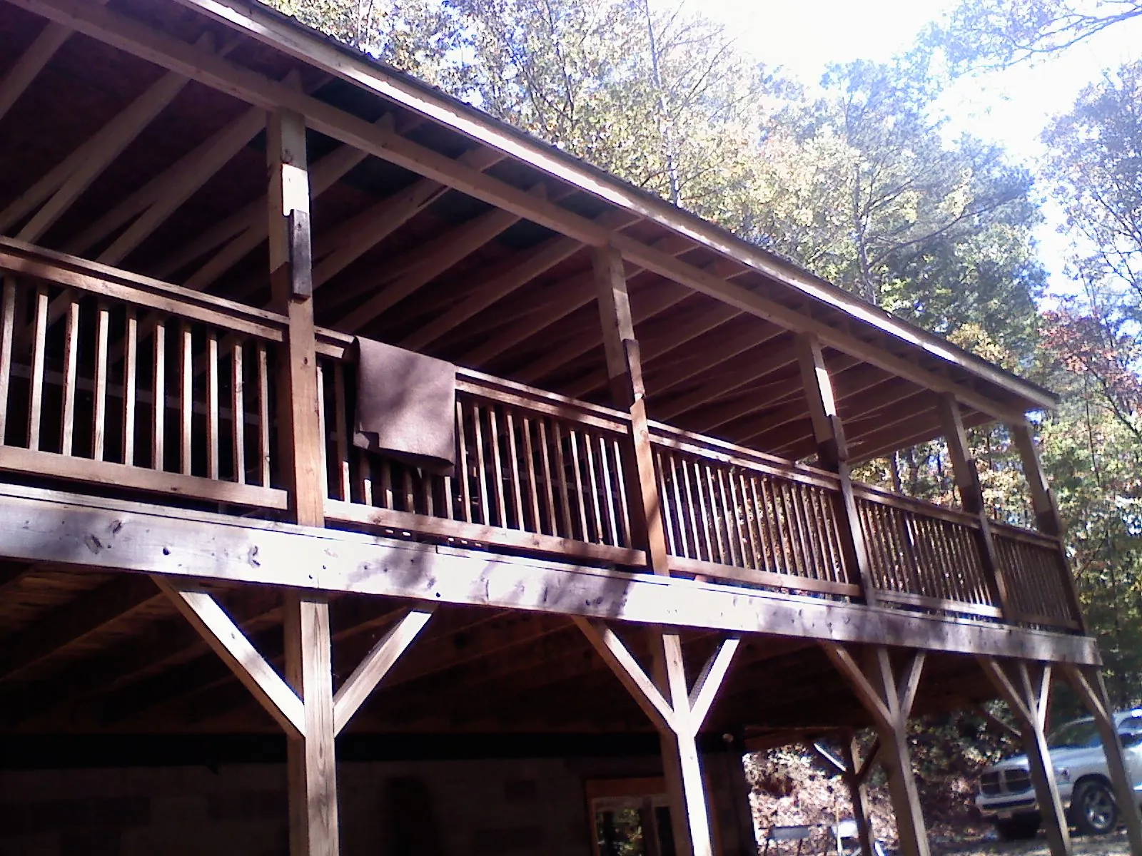 Timber framing under a new elevated porch and deck — Roof Leak Repair in Clarkfield by Roofing Brothers